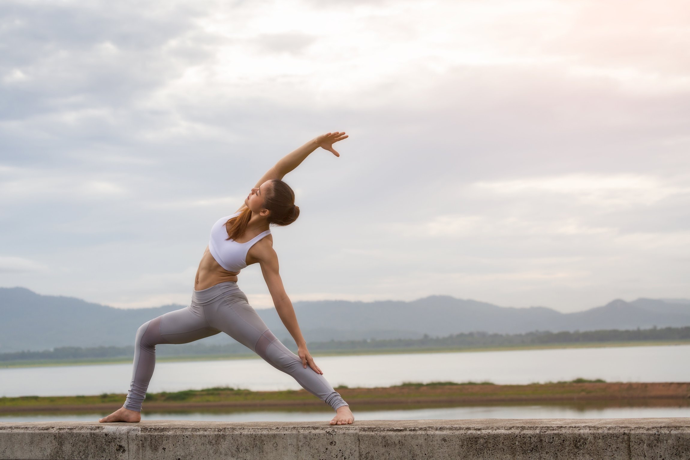 Asia woman doing yoga fitness exercise